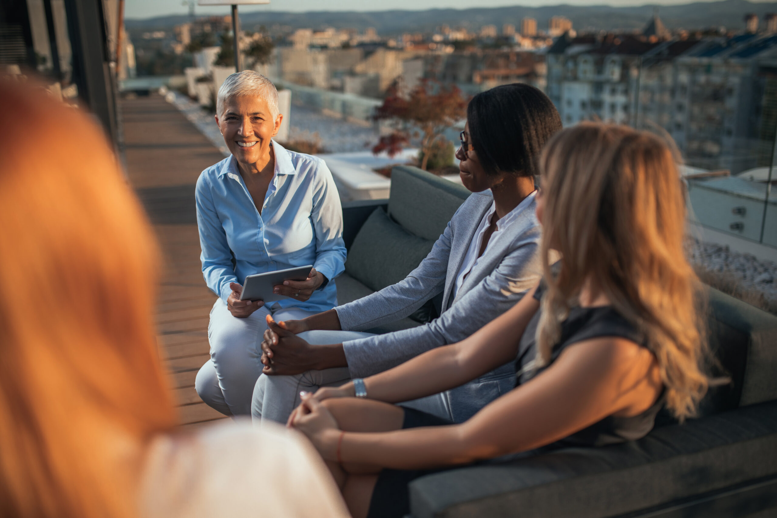 Four multinational businesswoman having a meeting
